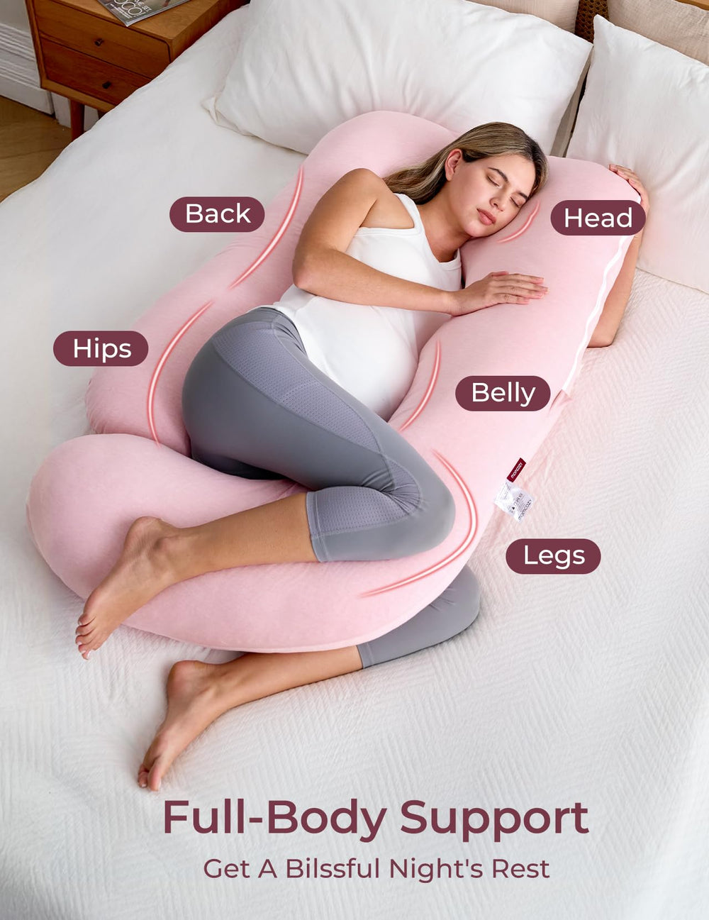 Momcozy 57-inch pillow fully spans for side sleeping comfort.