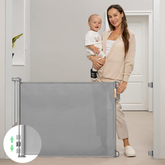Momcozy retractable gate extended to 71 inches in doorway.