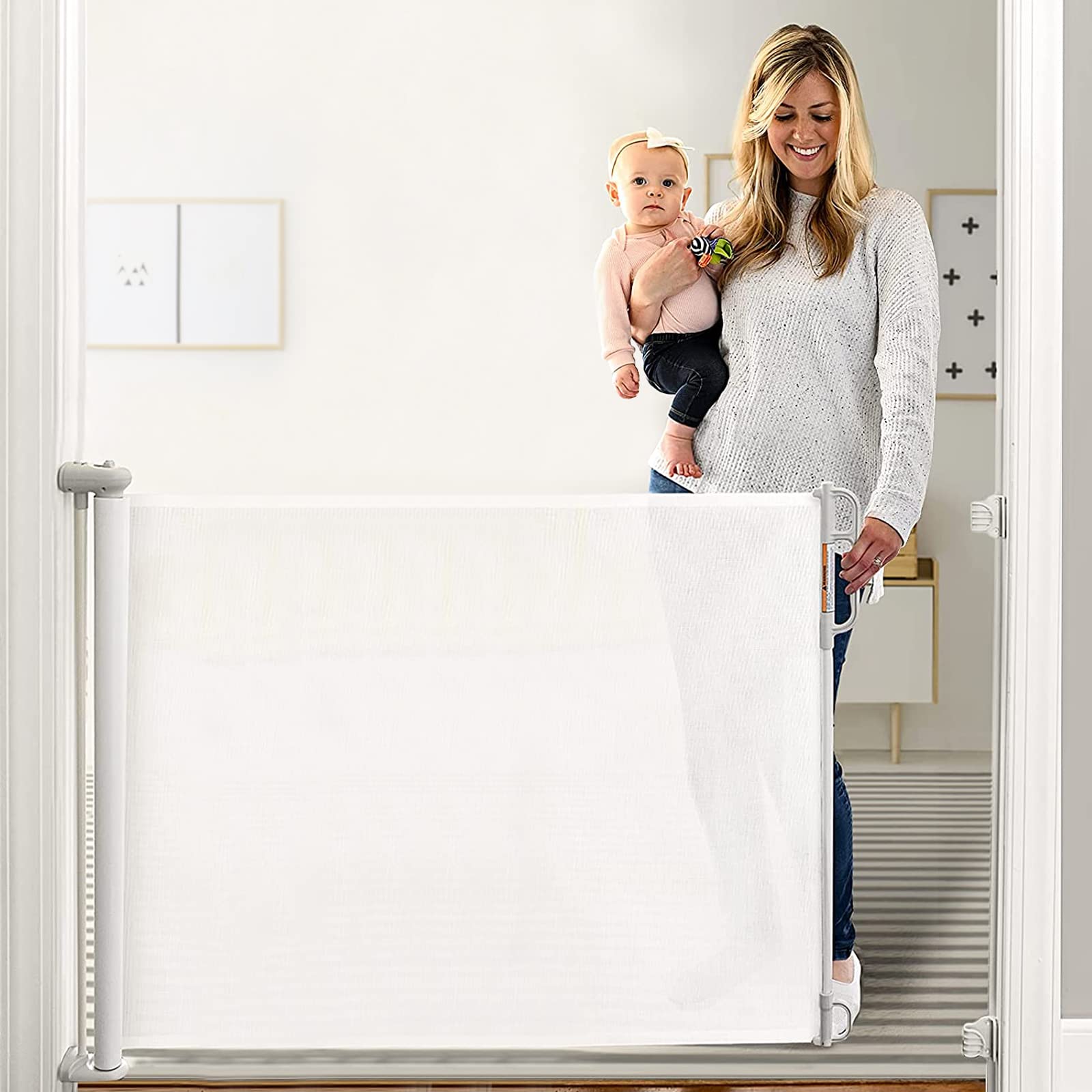 Momcozy retractable gate with open mesh for clear supervision at play.