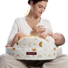 Momcozy safety guard nursing pillow ergonomic support for comfortable latching.