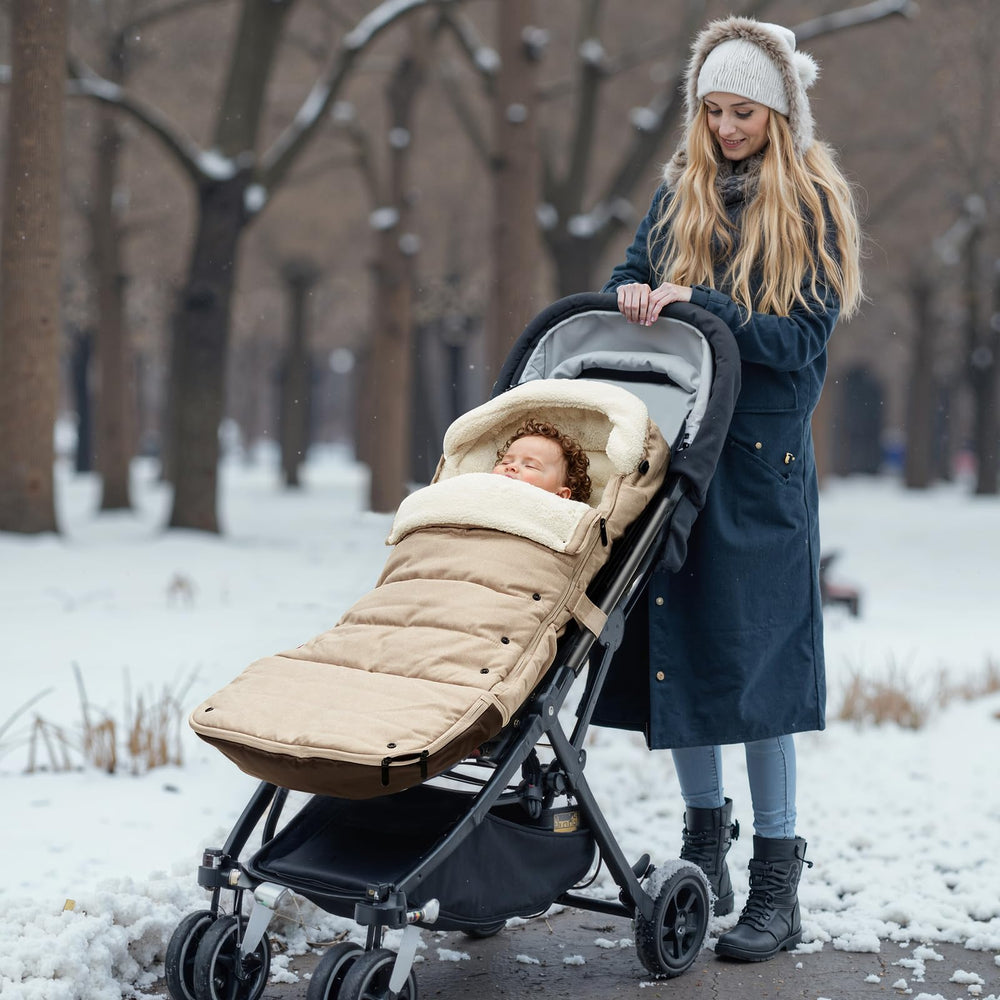 Momcozy adjustable drawstring hood shields baby from chilly winds.