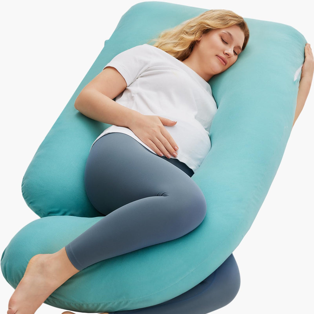 Momcozy U-shaped pregnancy pillow full view offering full-body support.