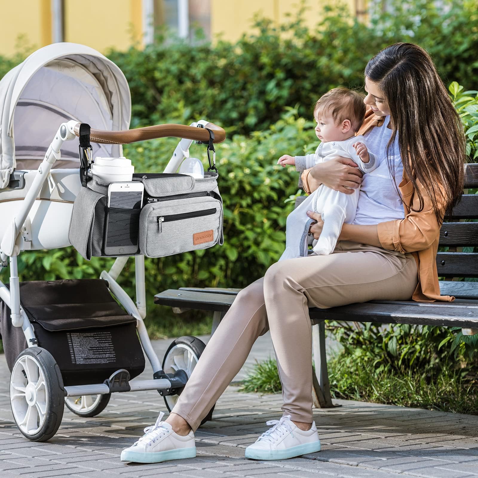 Momcozy organizer uses wide Velcro attachment for a flexible fit on many strollers.