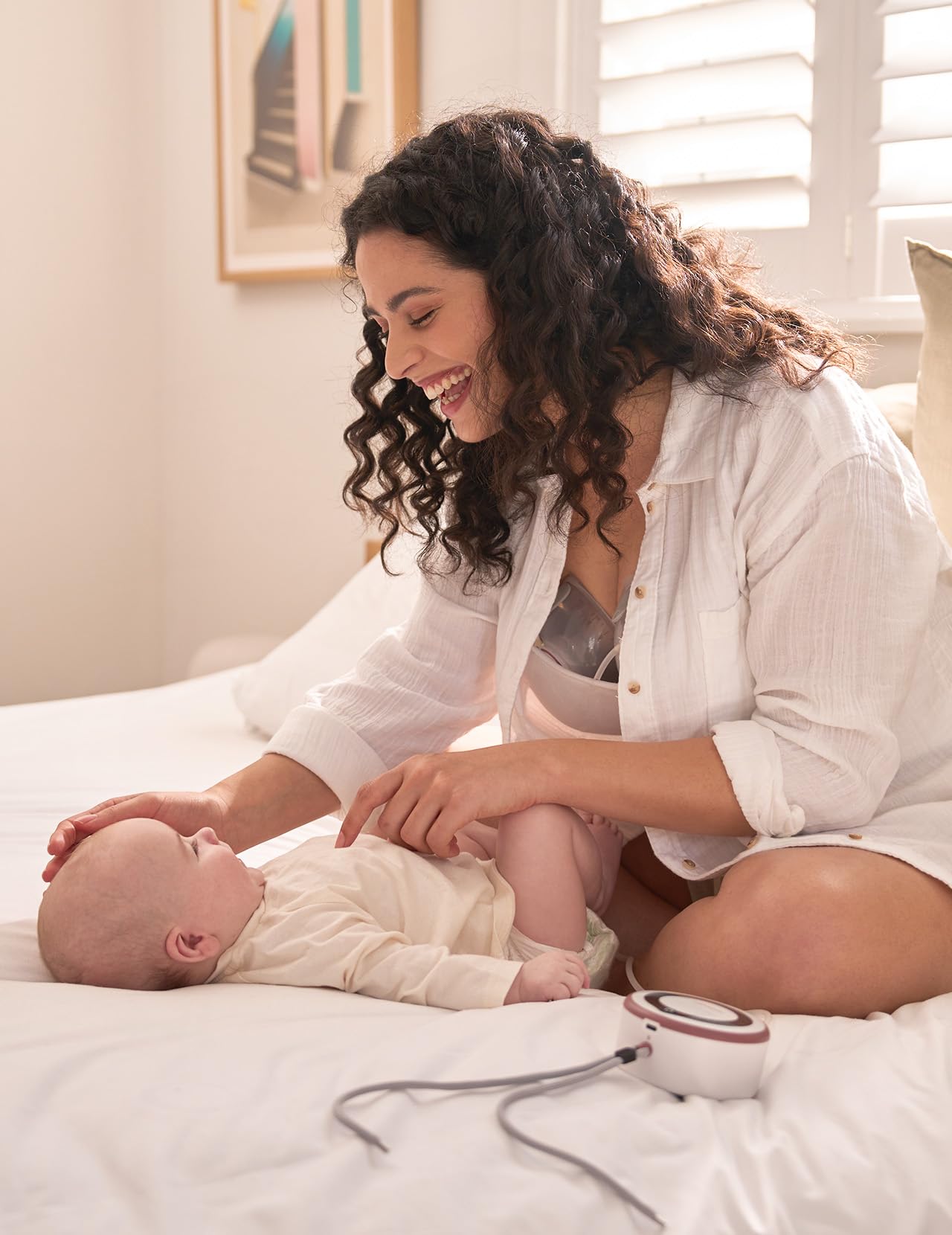 Momcozy V1 Pro wearable pump fits neatly inside a bra.