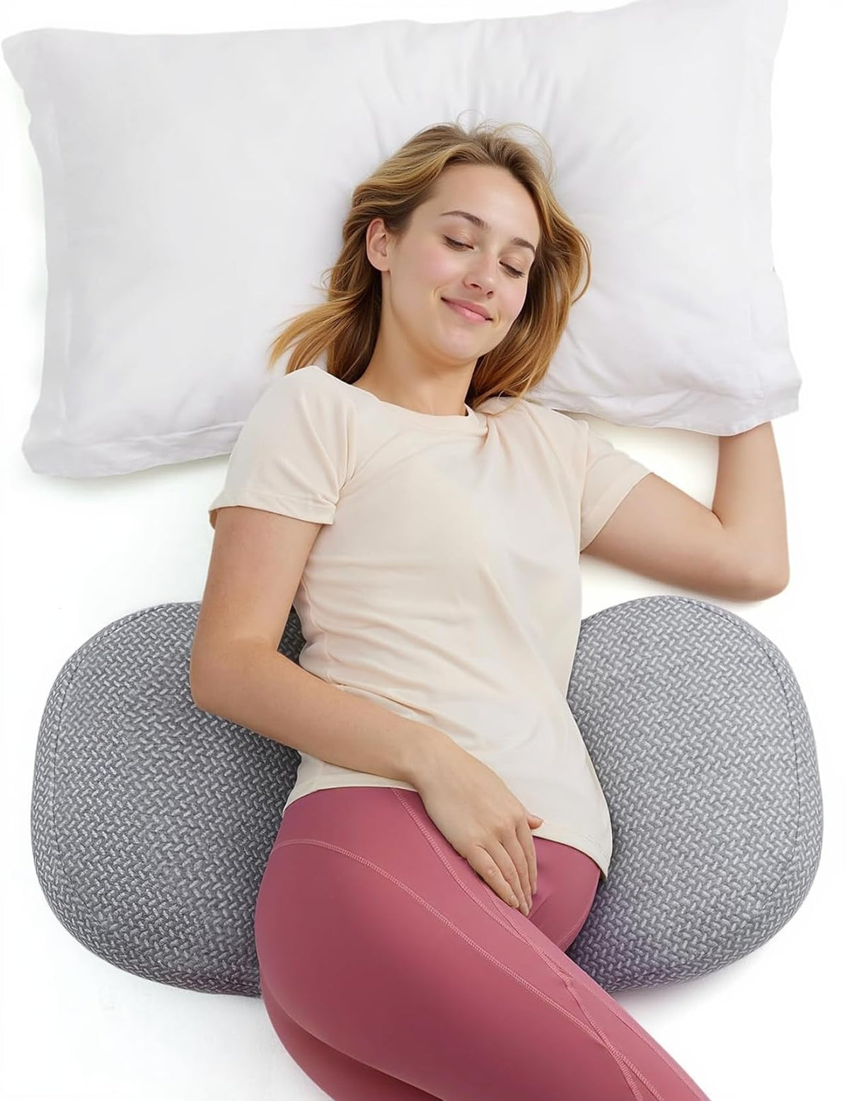 Momcozy W Shape pillow side-sleep close-up showing curved support for belly and back.