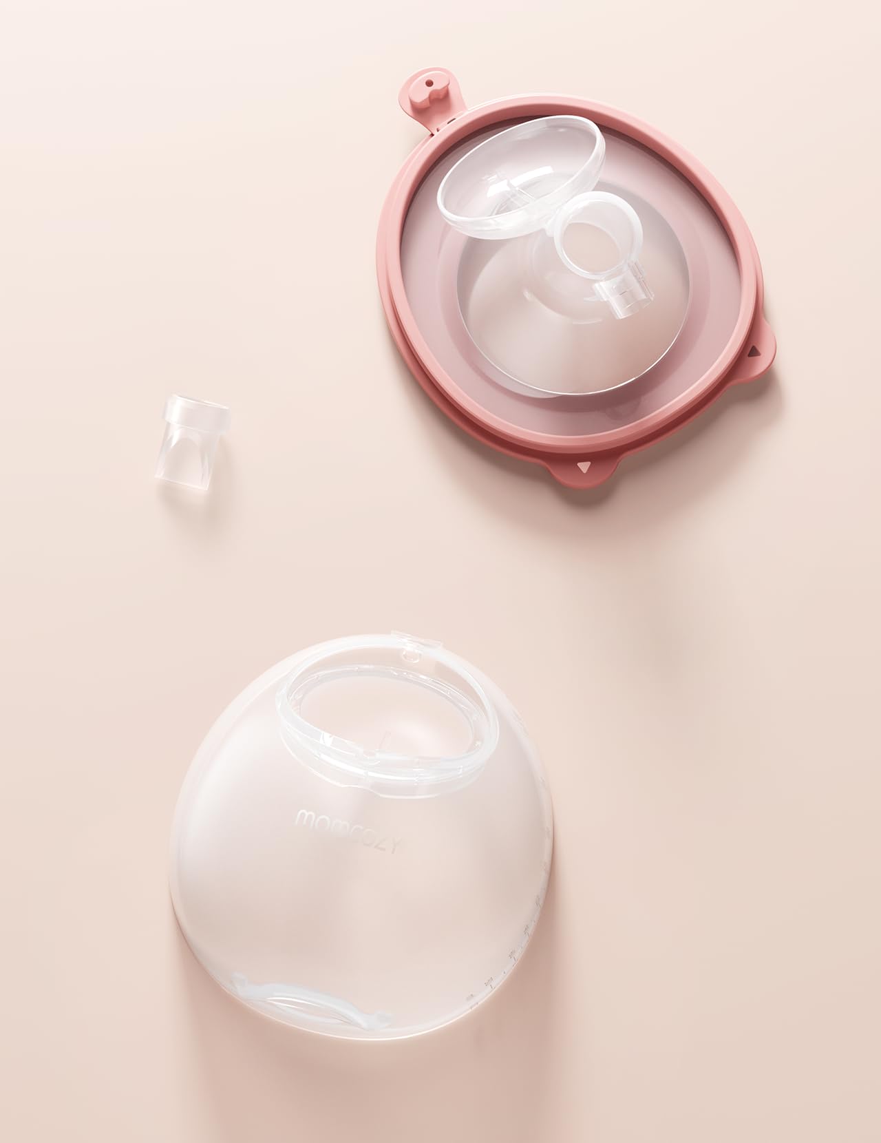 Momcozy wearable pump in use demonstrates portable pumping flexibility