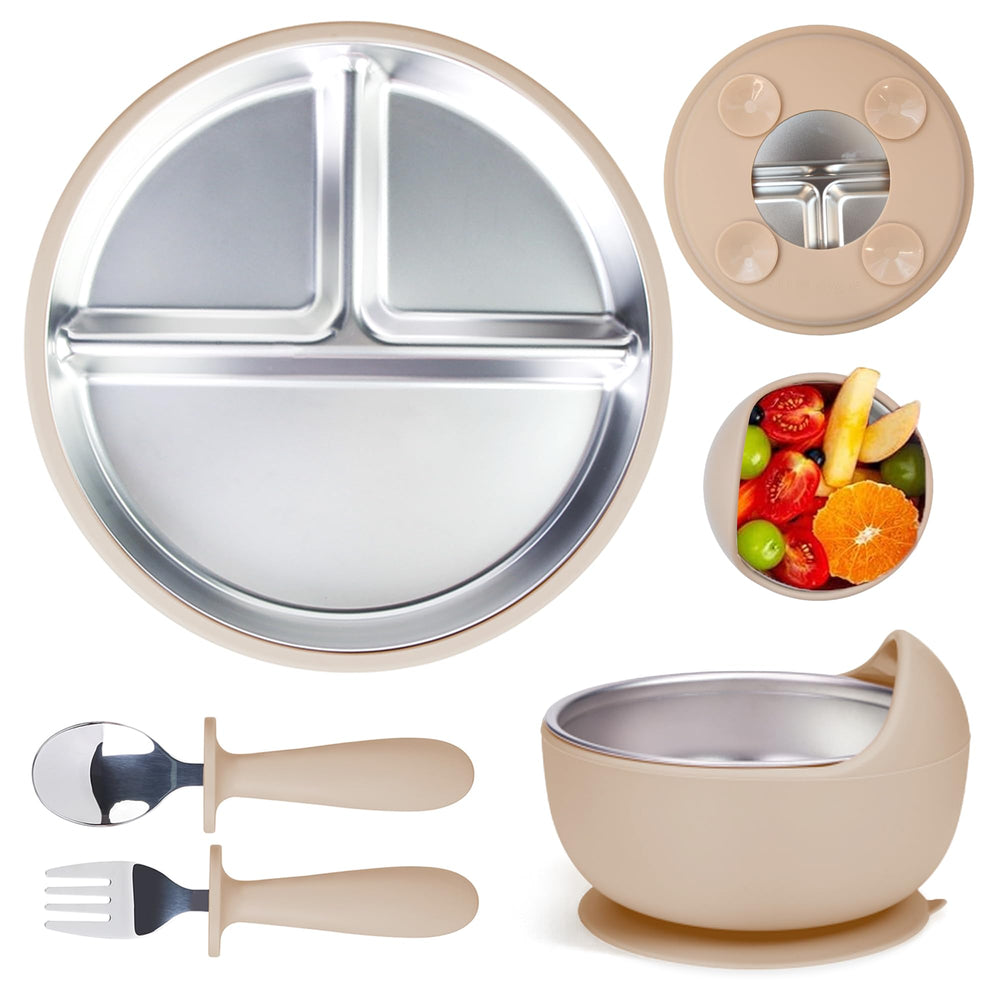 Momera stainless steel baby plate with suction base stabilizes meals on flat surfaces.