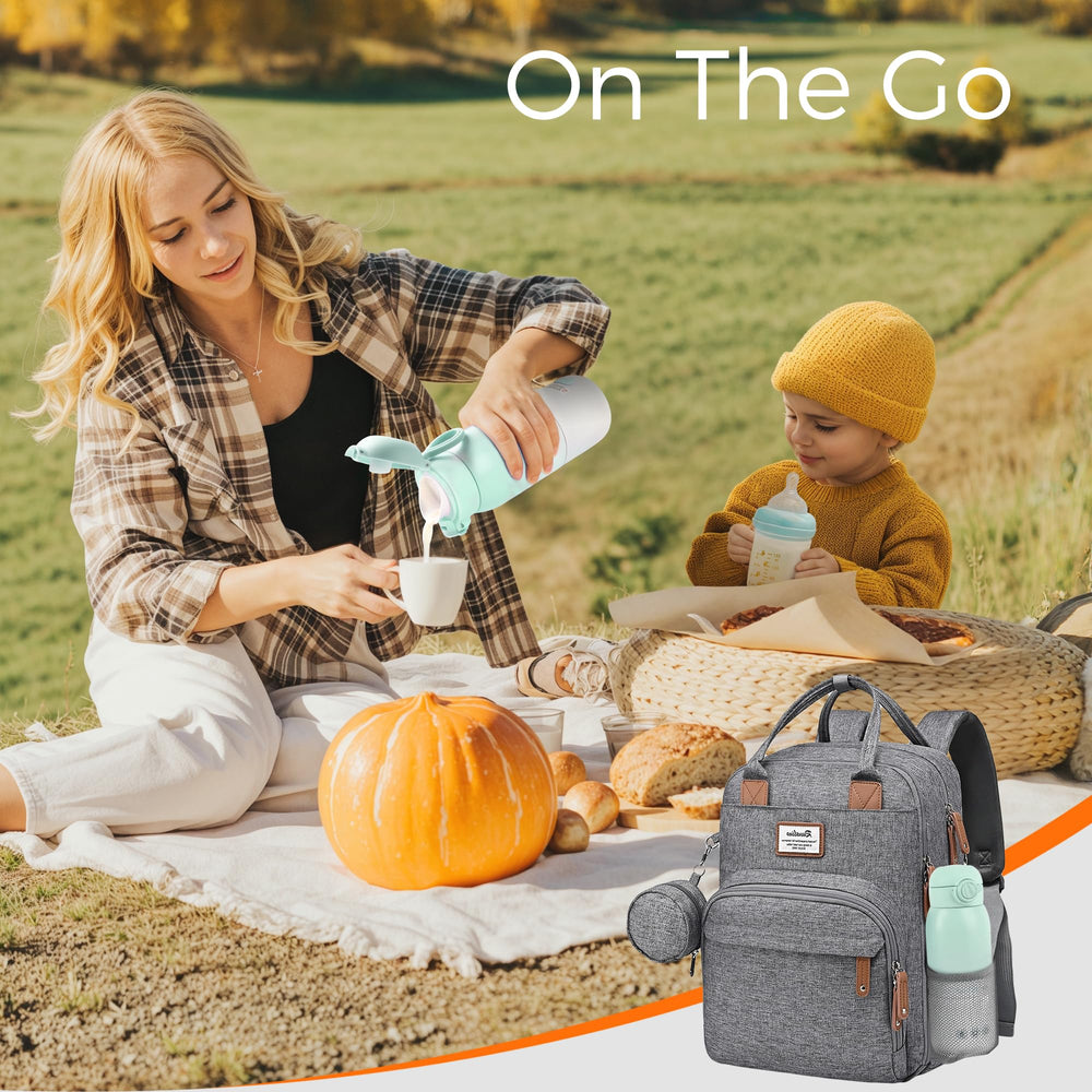 MOMFANN bottle warmer in travel bag for on-the-go use.