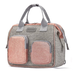 MOMIGO pink diaper bag backpack front view with organized pockets for quick access
