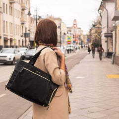 mommore tote with insulated pockets keeps bottles and shields ready