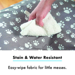 Mommy Leche cover shows water-resistant fabric to protect pillows during messes.