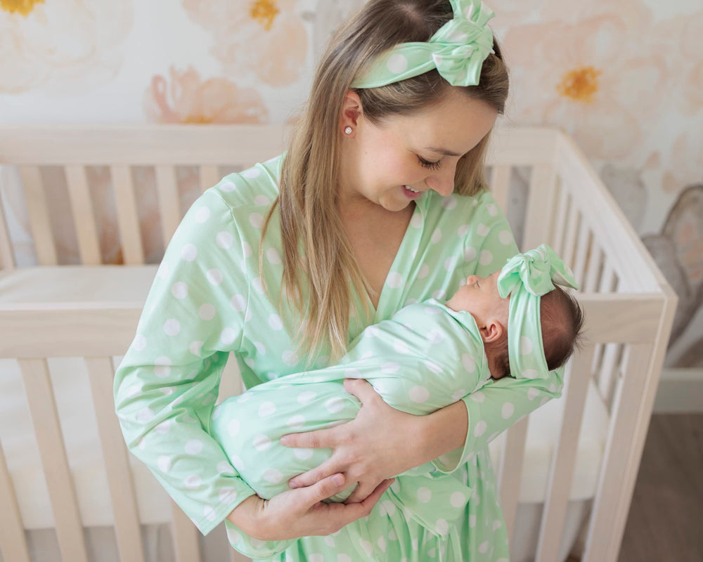 MOMMY O CLOCK baby swaddle blanket Mint Polka Dots keeps baby cozy and skin-friendly.