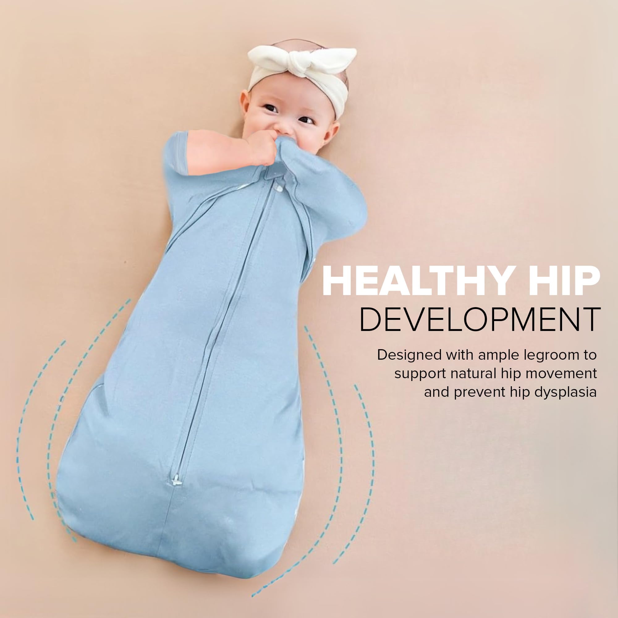 momobloom Baby Sleep Swaddle powder pink, baby wearing swaddle; cozy bedtime routine.