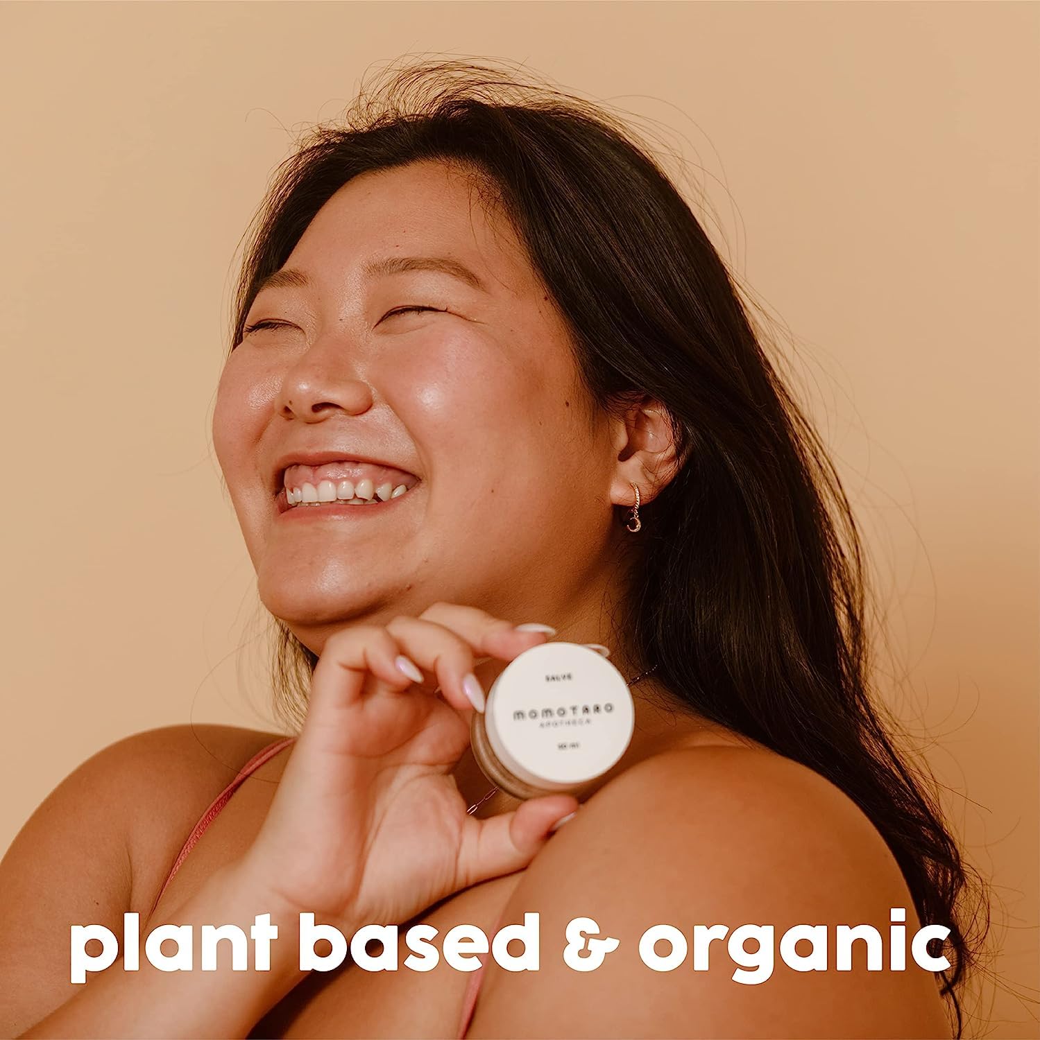 MOMOTARO APOTHECA balm texture on skin demonstrates creamy, fast-absorbing moisturization.
