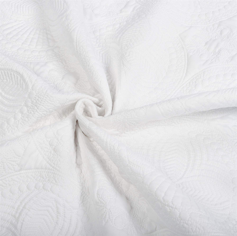 MONOBLANKS four seasons white quilt complements crib or toddler bed