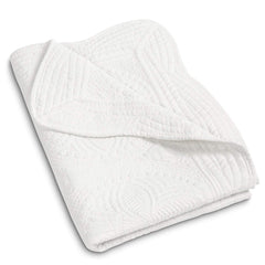MONOBLANKS baby quilt with scalloped edge adds delicate nursery accent