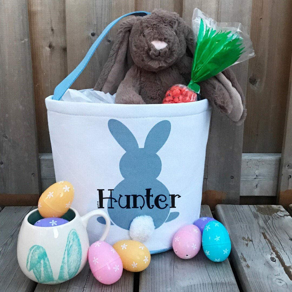 MONOBLANKS Easter Bunny Basket Blue egg-hunt setup, perfect for fun.