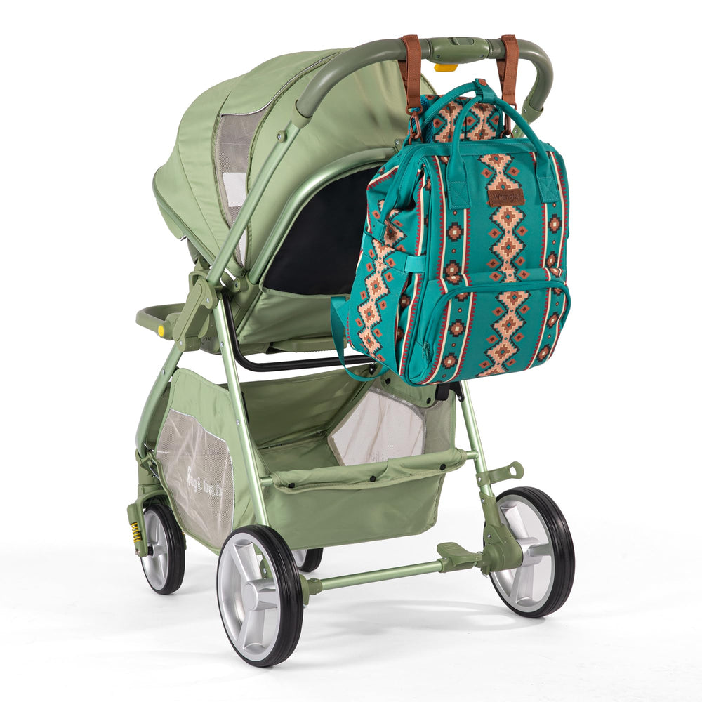 Insulated bottle pockets on Montana West Wrangler diaper bag for outings