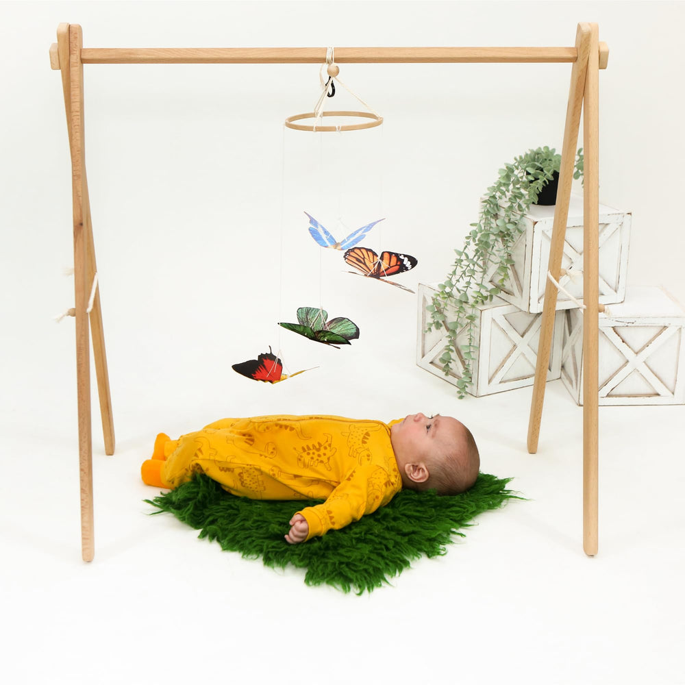 Montessori Baby Mobile Set natural materials closeup – beech wood and cotton textures.