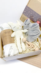 Moody Park gift box wrap elevates presentation for a thoughtful newborn gift.