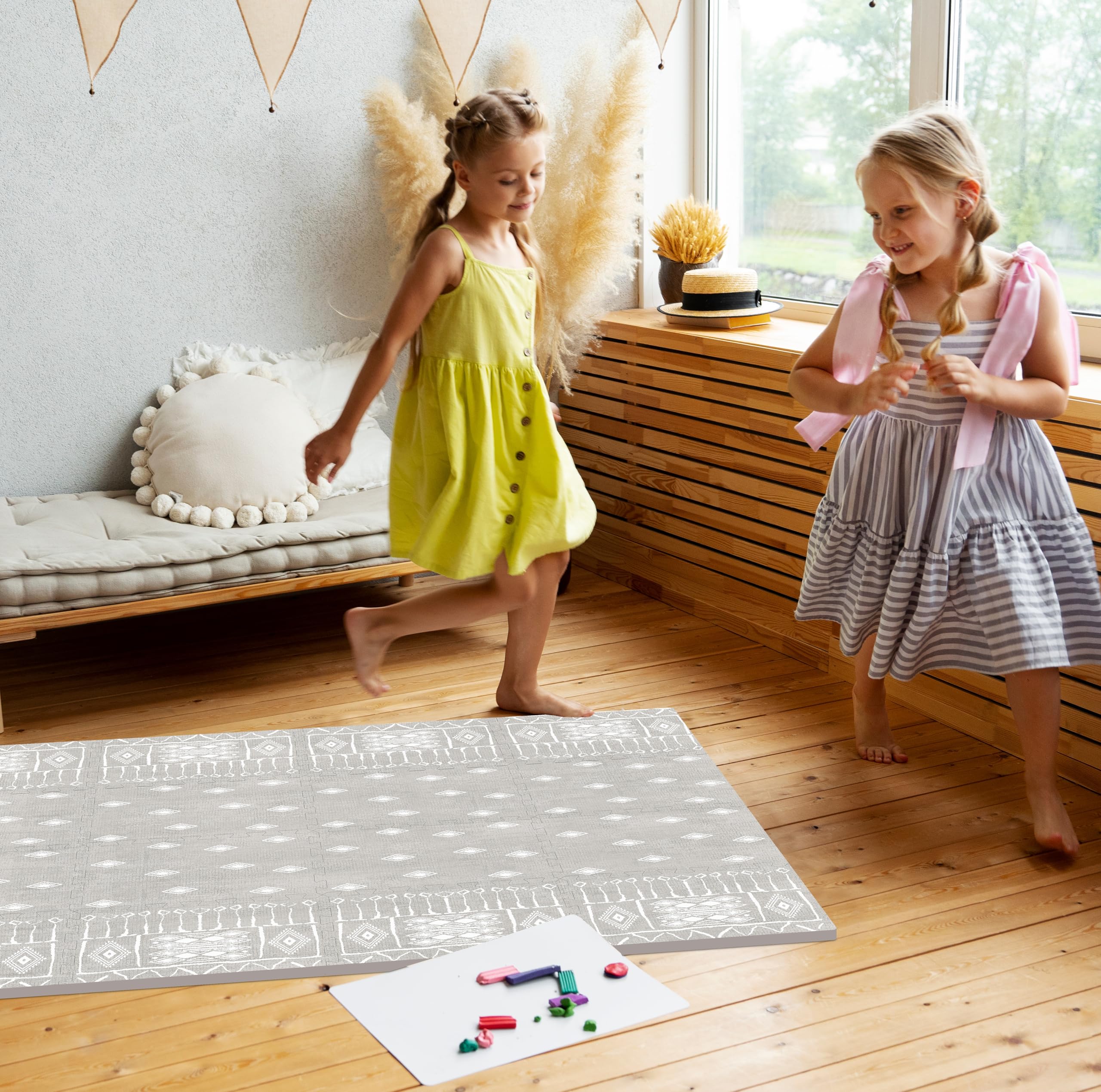 Moon Walkers Ash Starlight playmat tummy-time setup on foam