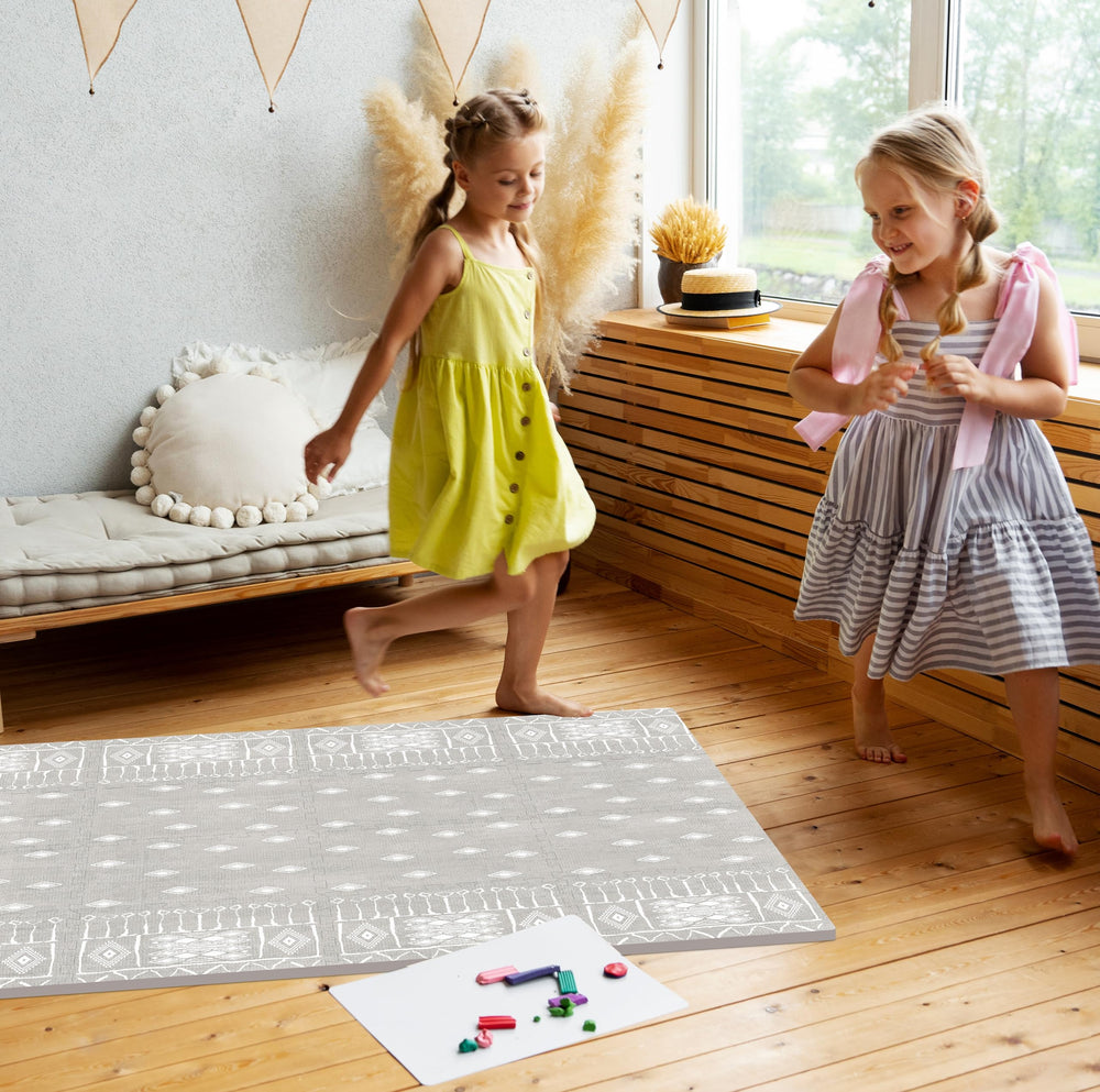 Moon Walkers Ash Starlight playmat tummy-time setup on foam