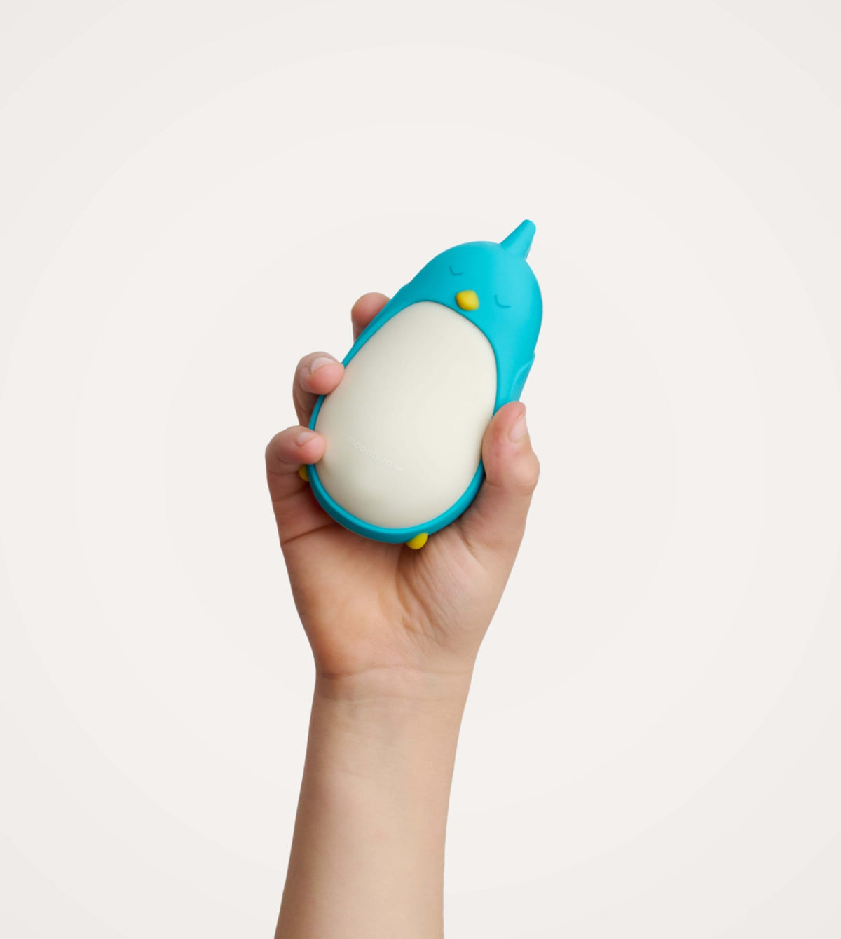 Moonbuddy front view on a desk guiding kids through calming breathing sessions.