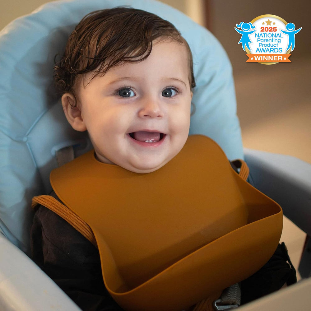 Moonkie BPA-free silicone bibs offering gentle skin contact during meals.