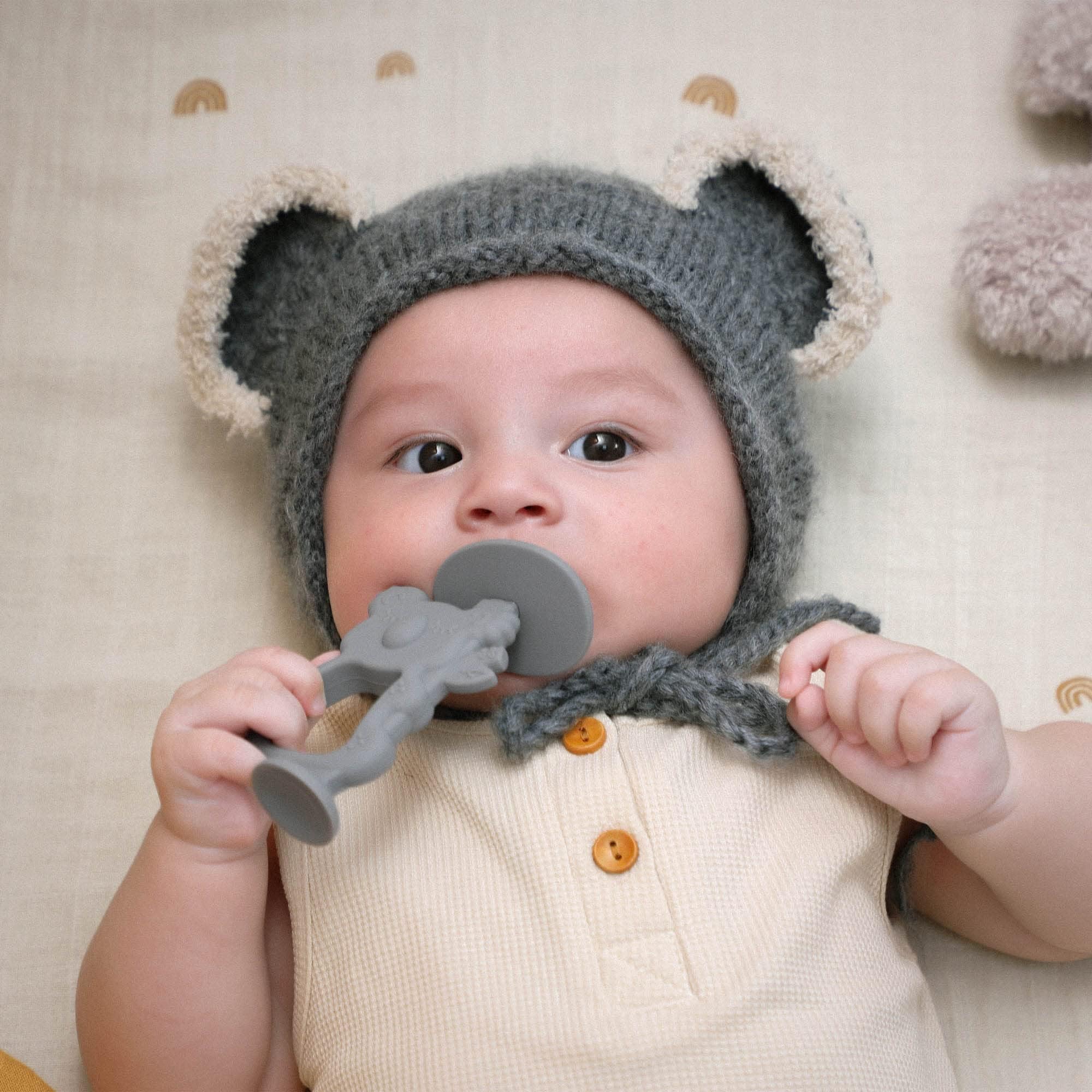 Moonkie Koala Teether with easy-grip handle for small hands.