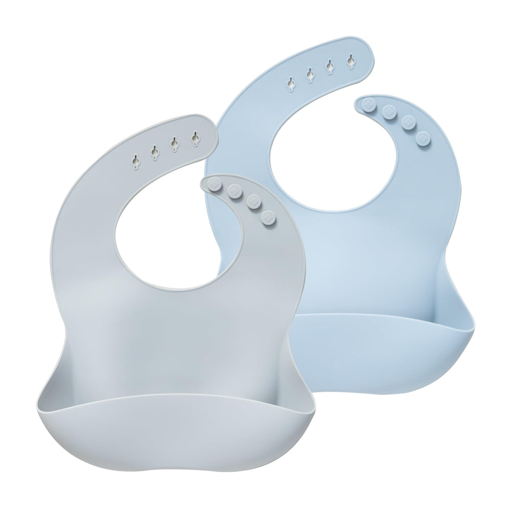Moonkie silicone bib with pocket open catches crumbs during feeding.