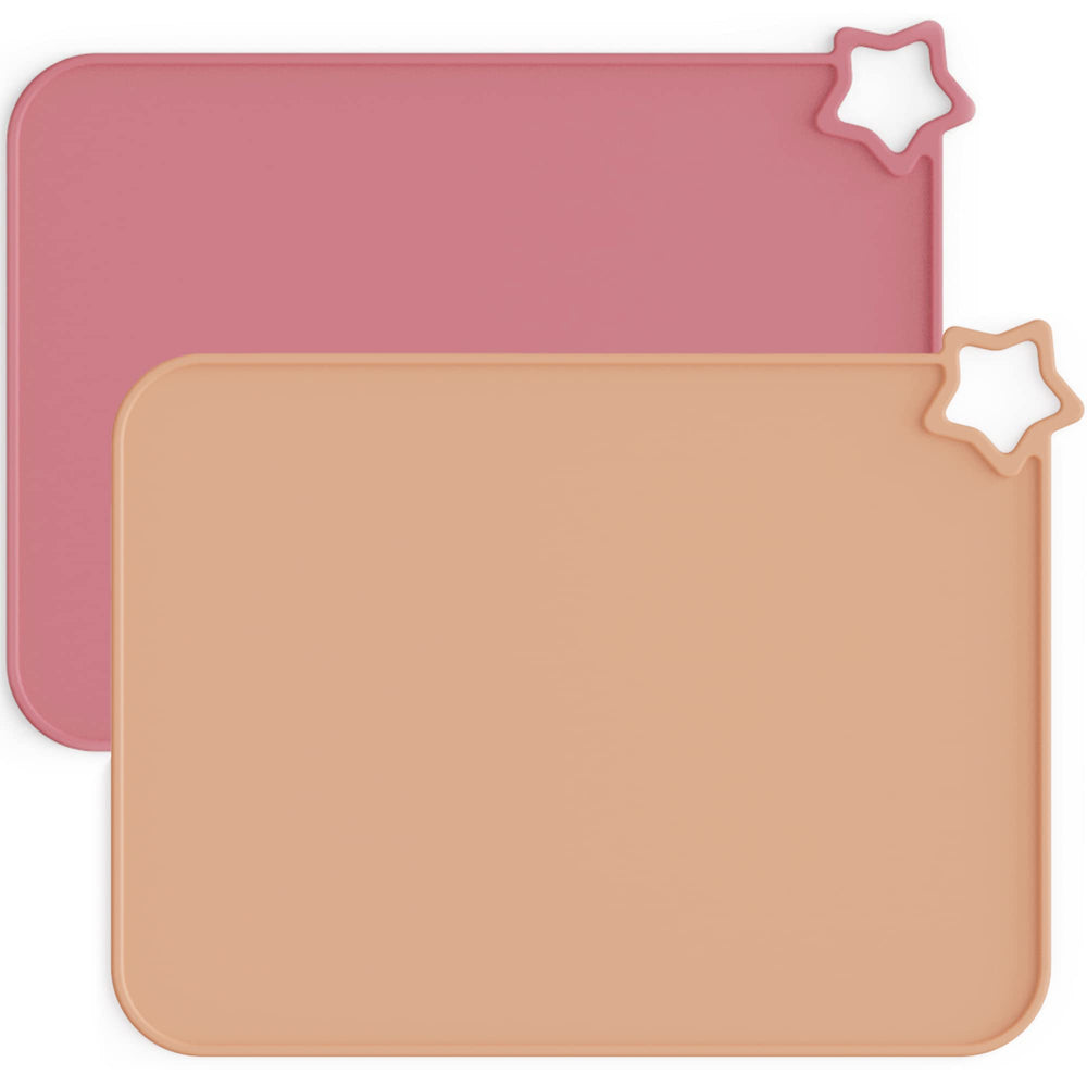 Moonkie silicone placemats with kid-edge mess containment on the table to reduce spills.