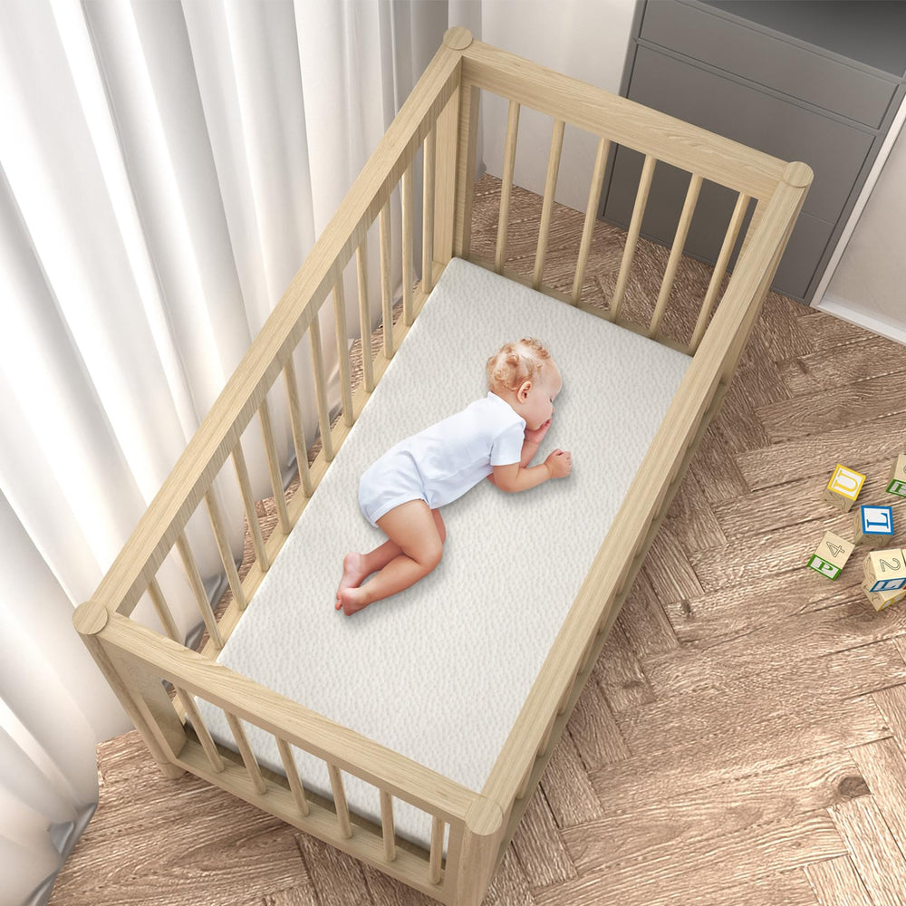 Moonlightfamily toddler mattress with TPU back cover blocks liquids from inner foam.