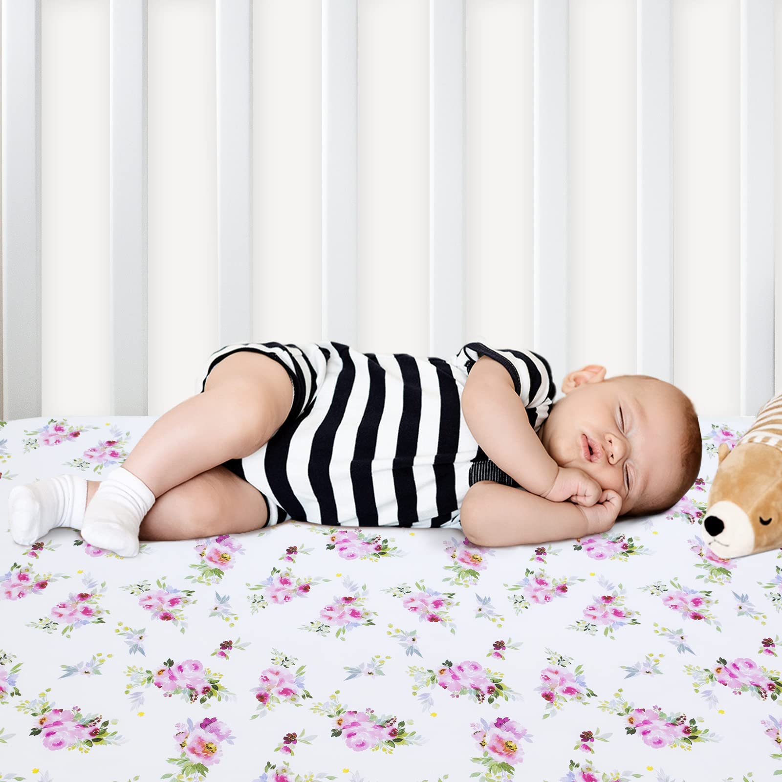 Moonsea snug-fit edge keeps sheets securely in place on standard cribs.
