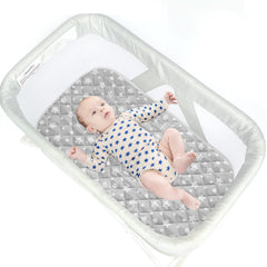 Moonsea elastic-skirt fit secures various bassinet shapes with ease.