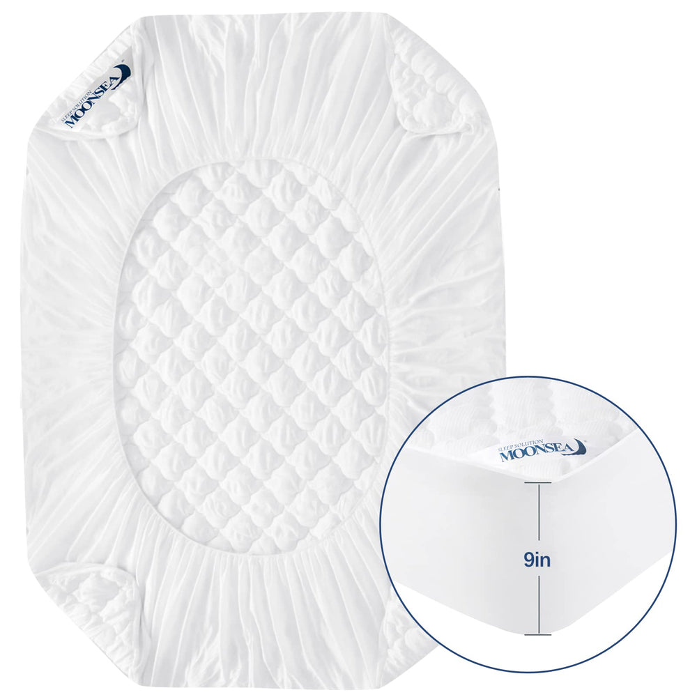 Moonsea protector in use with a travel bed and trusted Moonsea support guarantee.