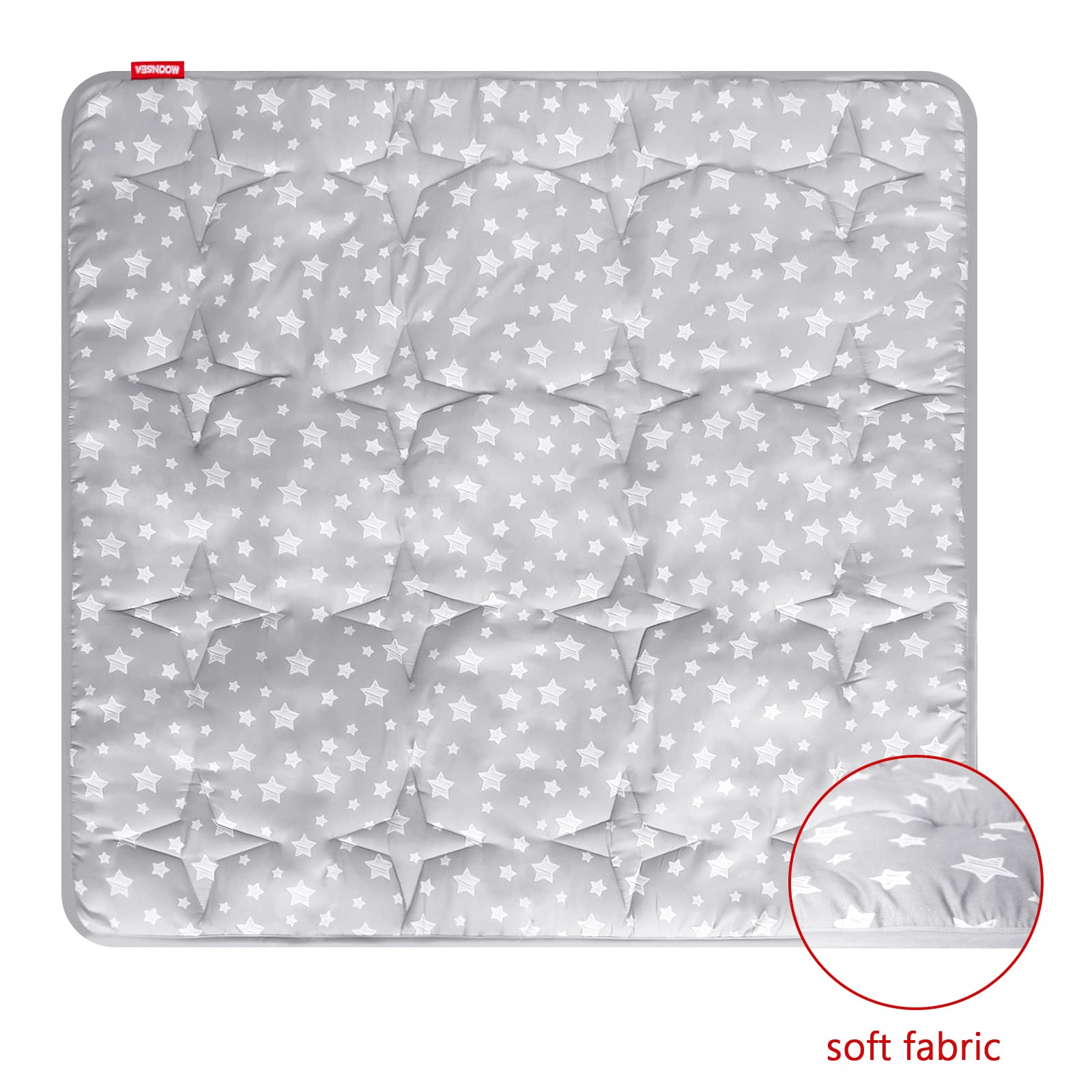 Moonsea nursery quilted rug close-up highlights soft padding.