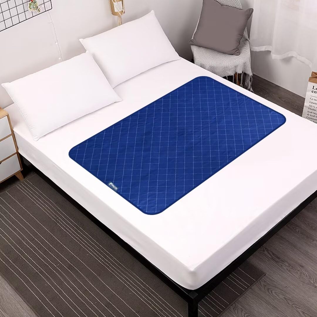Moonsea waterproof mattress pad navy cover protects beds from spills with a soft touch.