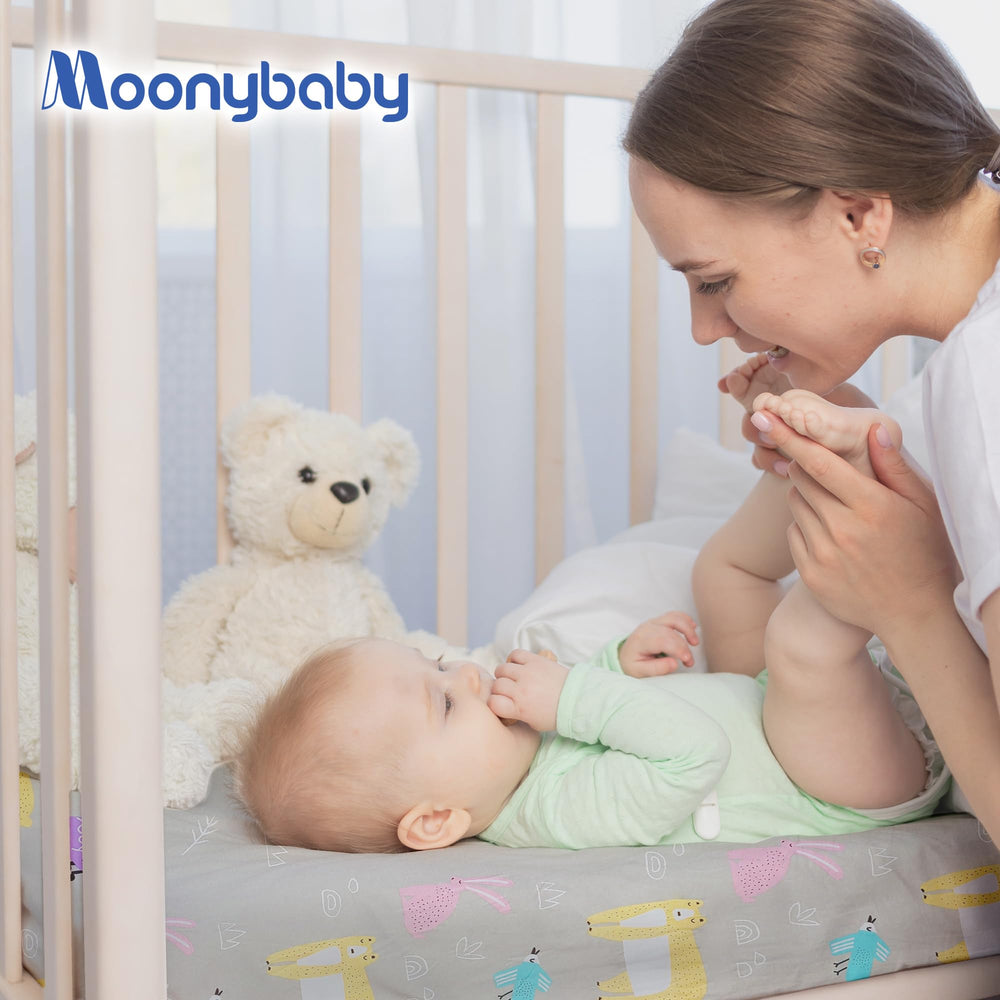 Moonybaby 2-pack crib sheets ready for rotation between washes.