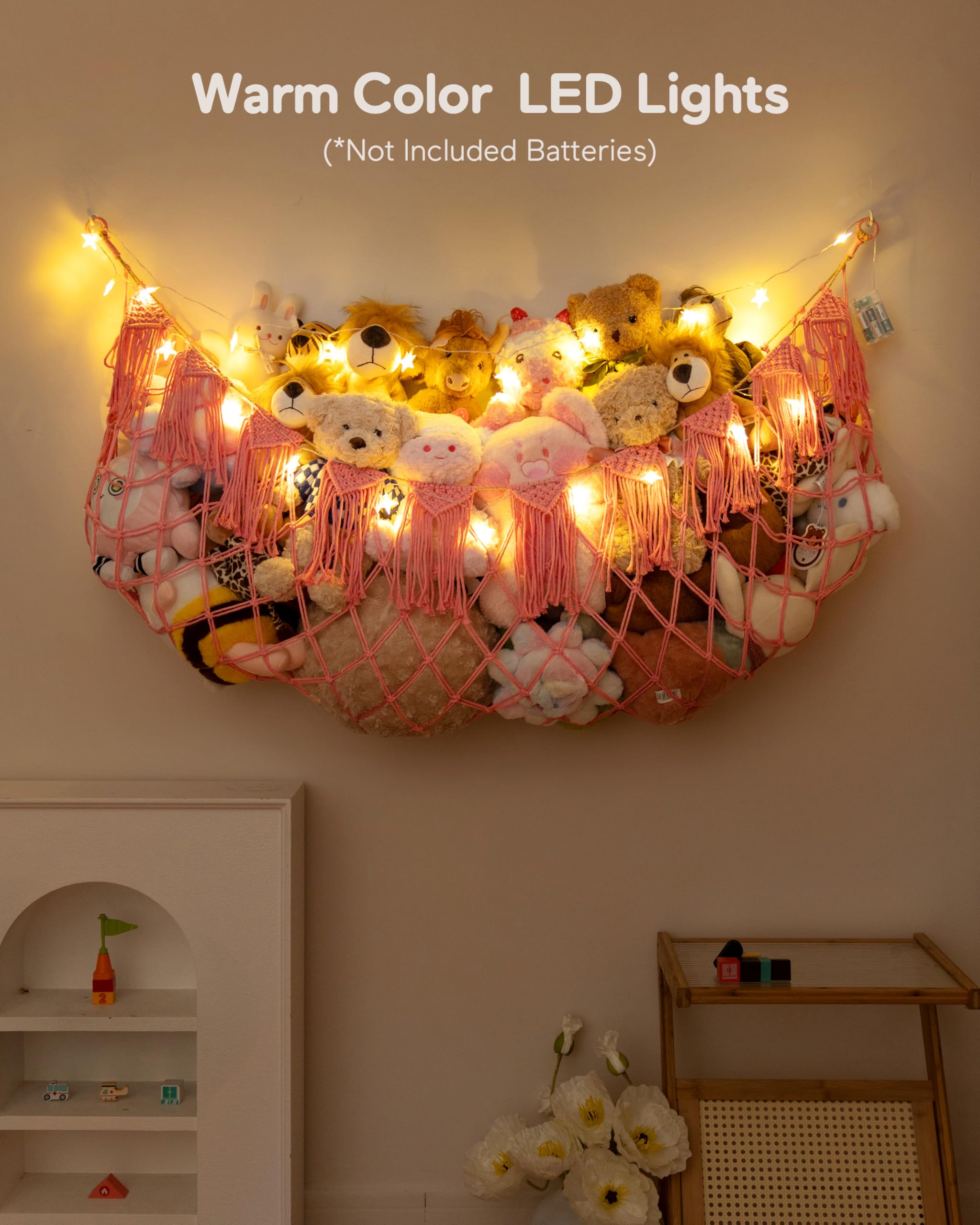 MORCCO pink tassels and night light enhance nursery charm and ambiance.