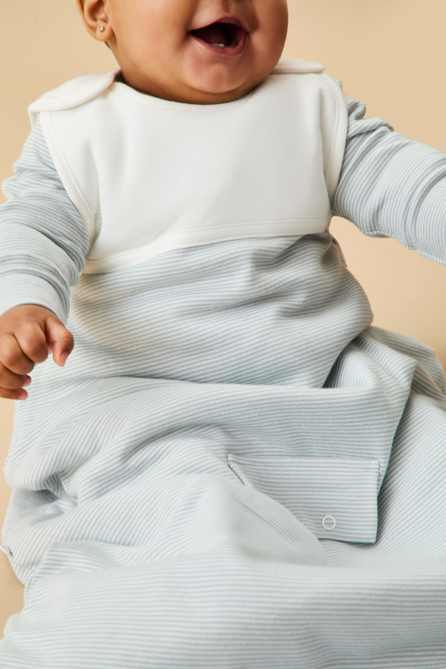 MORI blue stripe sleep sack offers snug neck and easy access