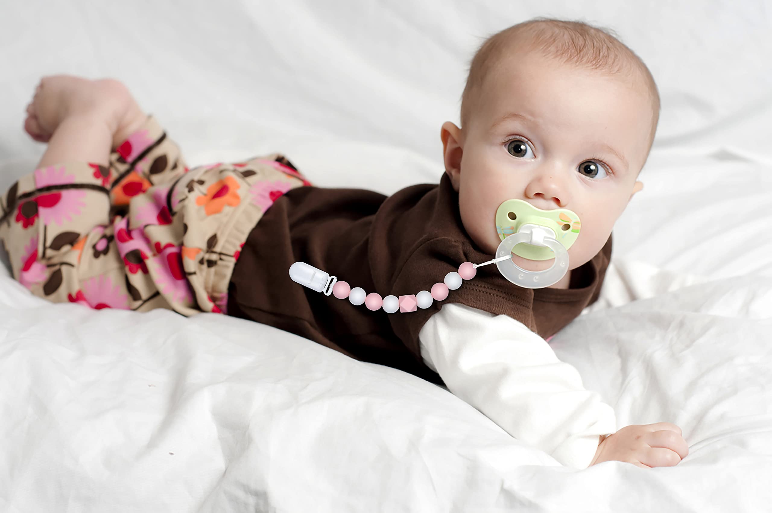 MORIBOX pink pacifier clip close-up shows chic vintage-inspired design