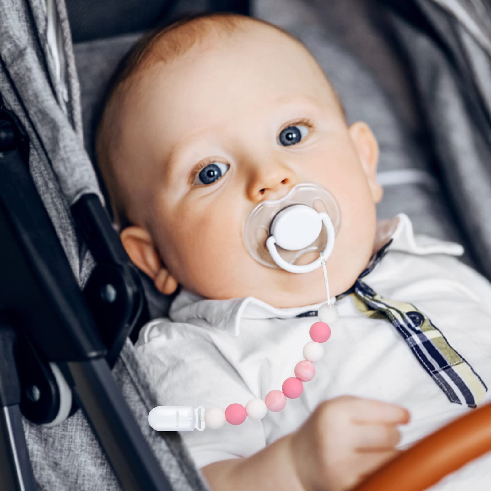 MORIBOX pacifier clips closeup—clip attachment provides secure hold for busy moments