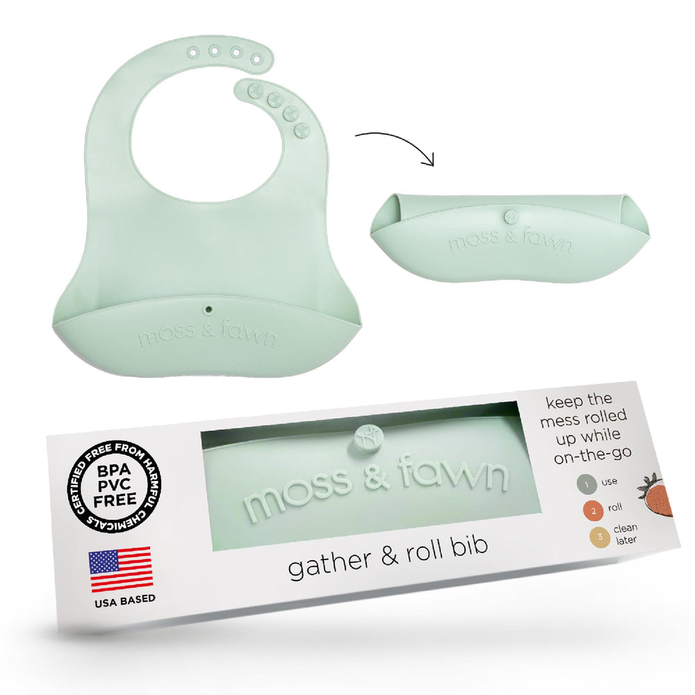 Moss and Fawn Gather & Roll Bib in fern for easy on-the-go meals.