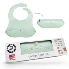 Moss and Fawn Gather & Roll Bib in fern for easy on-the-go meals.