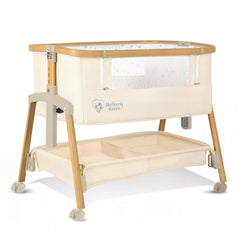Motherly Haven baby bassinet side view with breathable mesh for safe airflow.