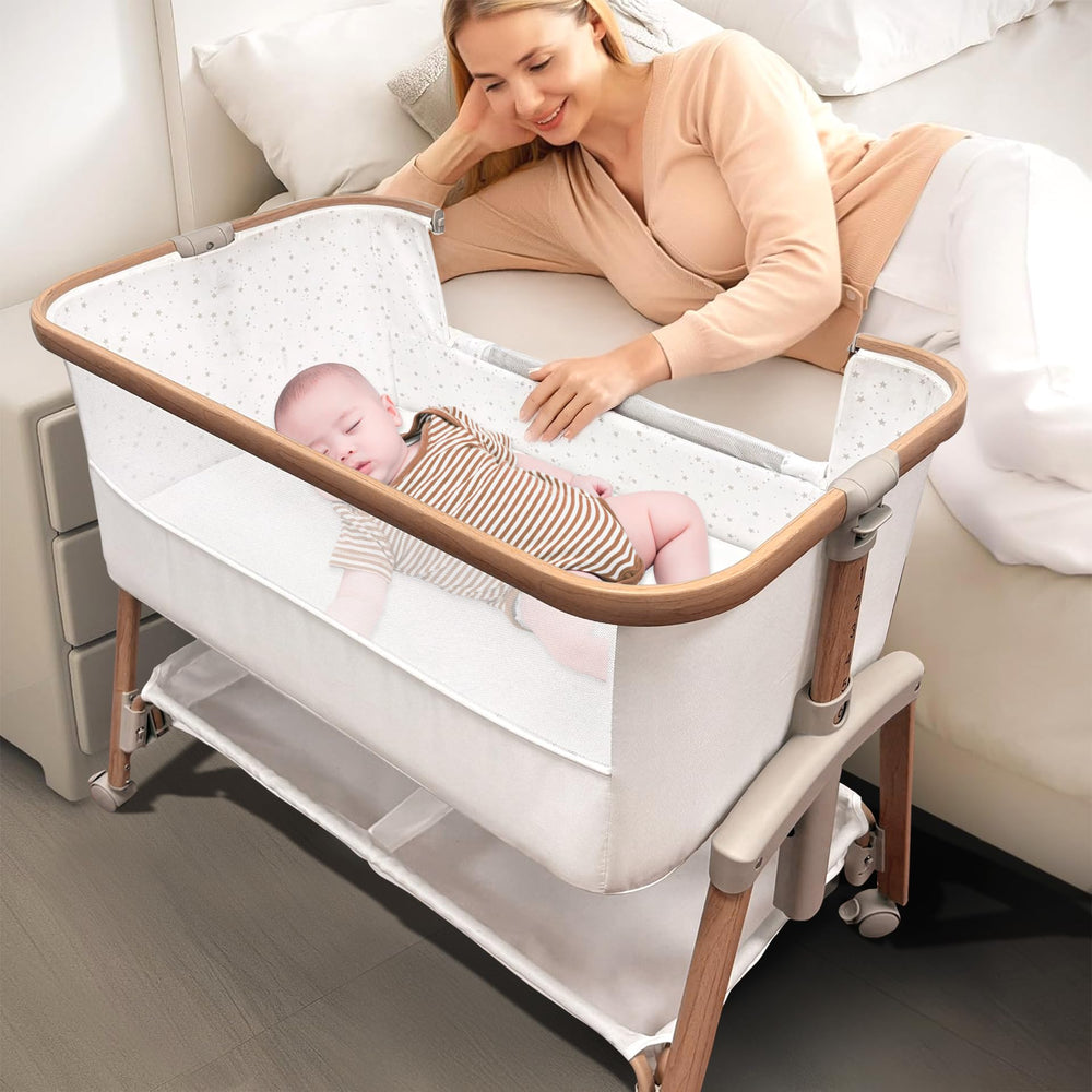 Motherly Haven bedside sleeper beside bed for easy nighttime soothing and feeding.