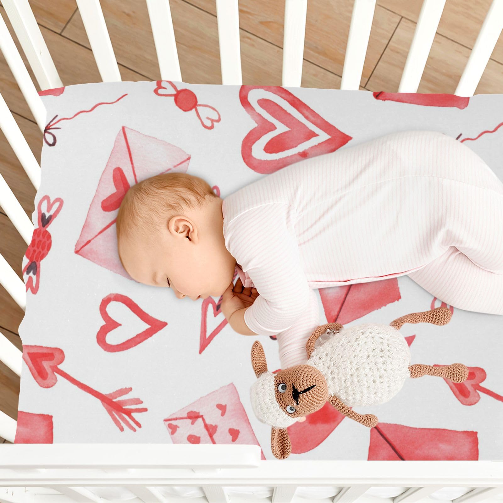 Moudou Valentine's heart crib sheet features easy-care washing instructions.