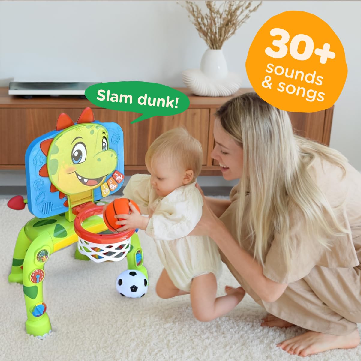 Move2Play dinosaur hoop shot – toddlers practice aiming with basketball play.