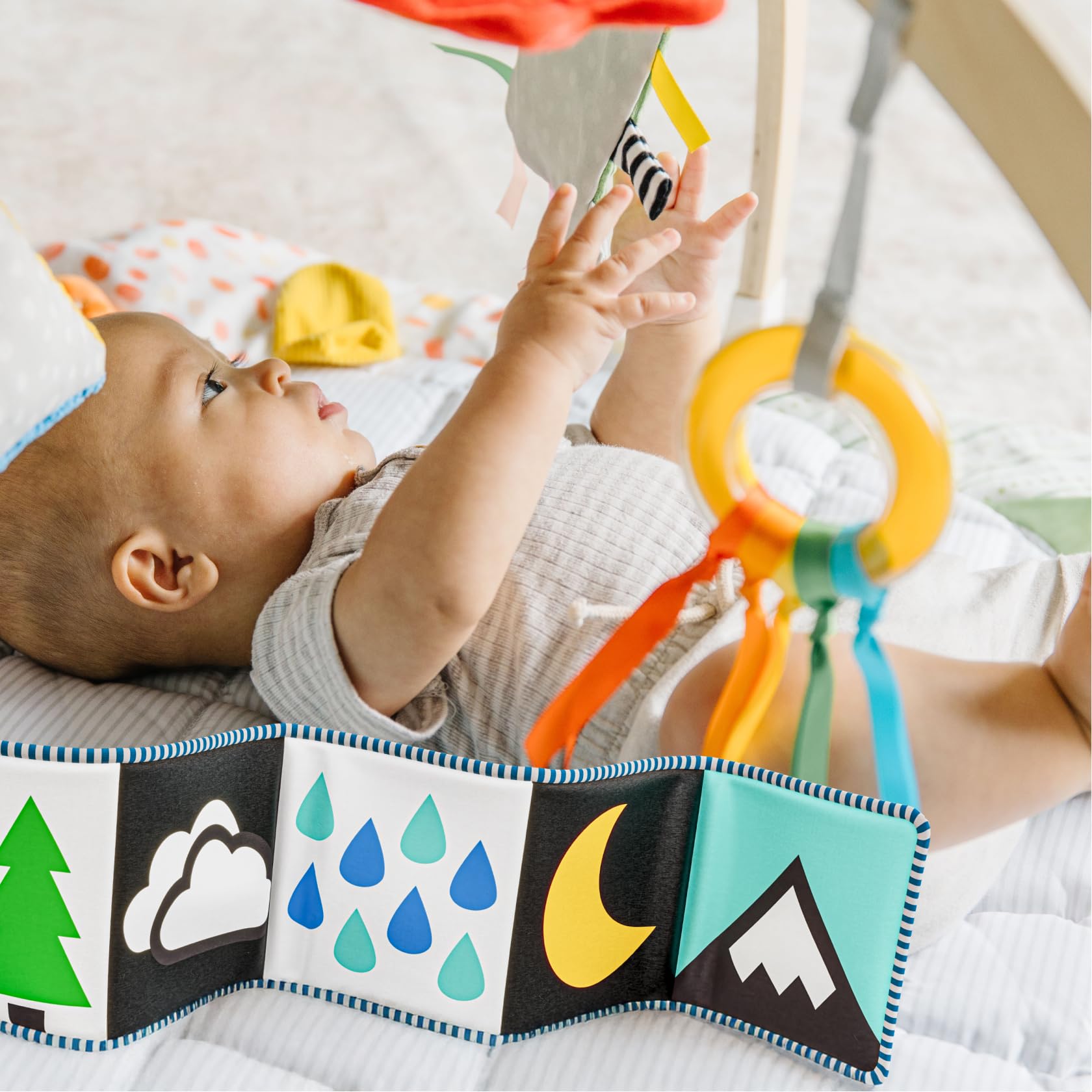 Move2Play padded mat provides a large safe space for tummy time and movement