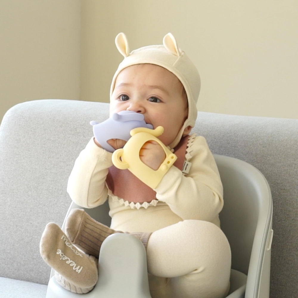 MOYUUM elephant teether features multi-texture ridges for teething needs.